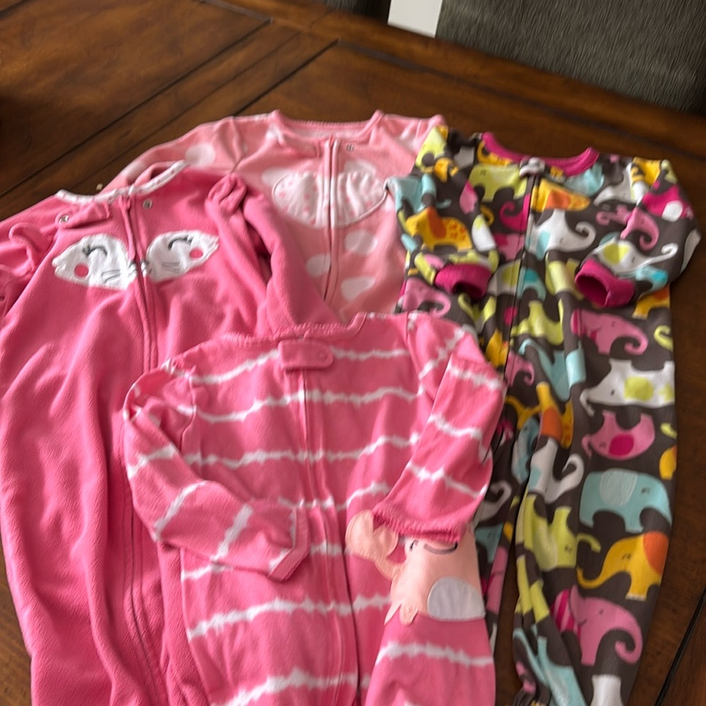 Carter’s footed pajamas. 4 pairs girls size 24mo/2yr